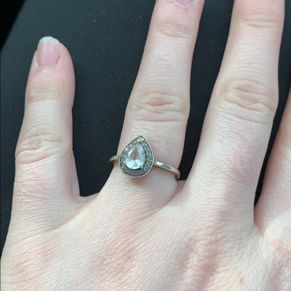 Size 5 sterling silver ring. Diamonds are fake